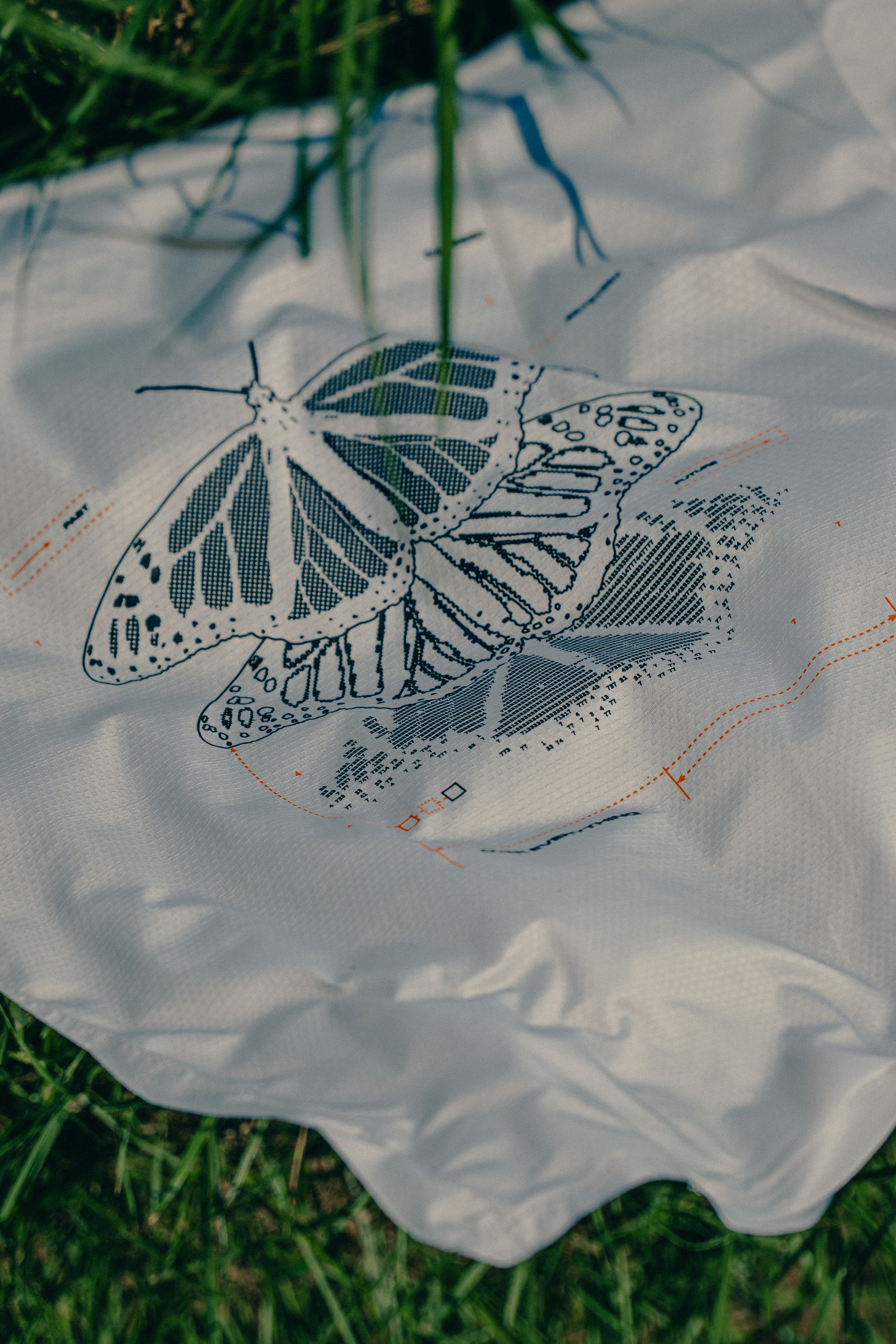 Metamorphosis Performance Tee