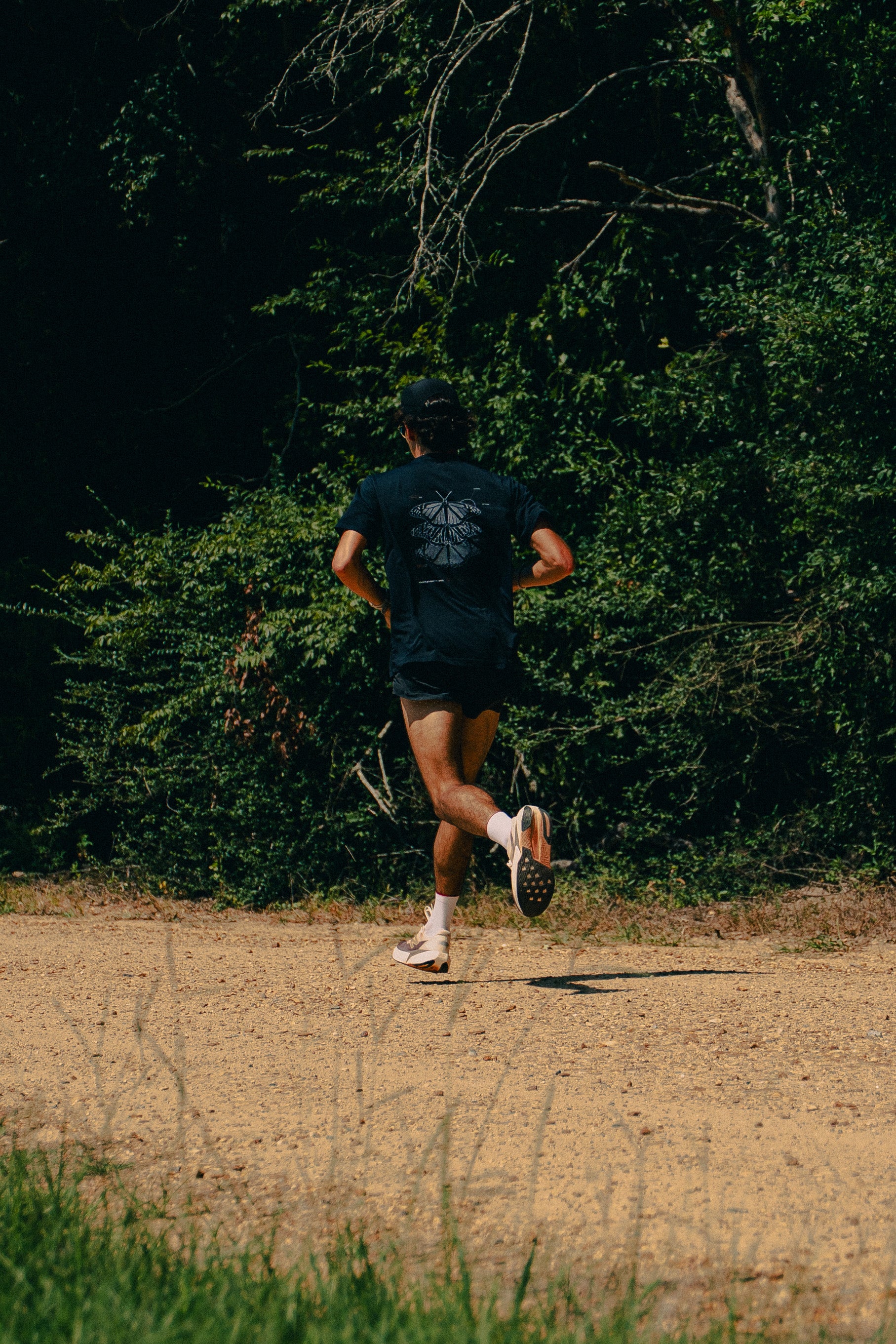 Metamorphosis Performance Tee