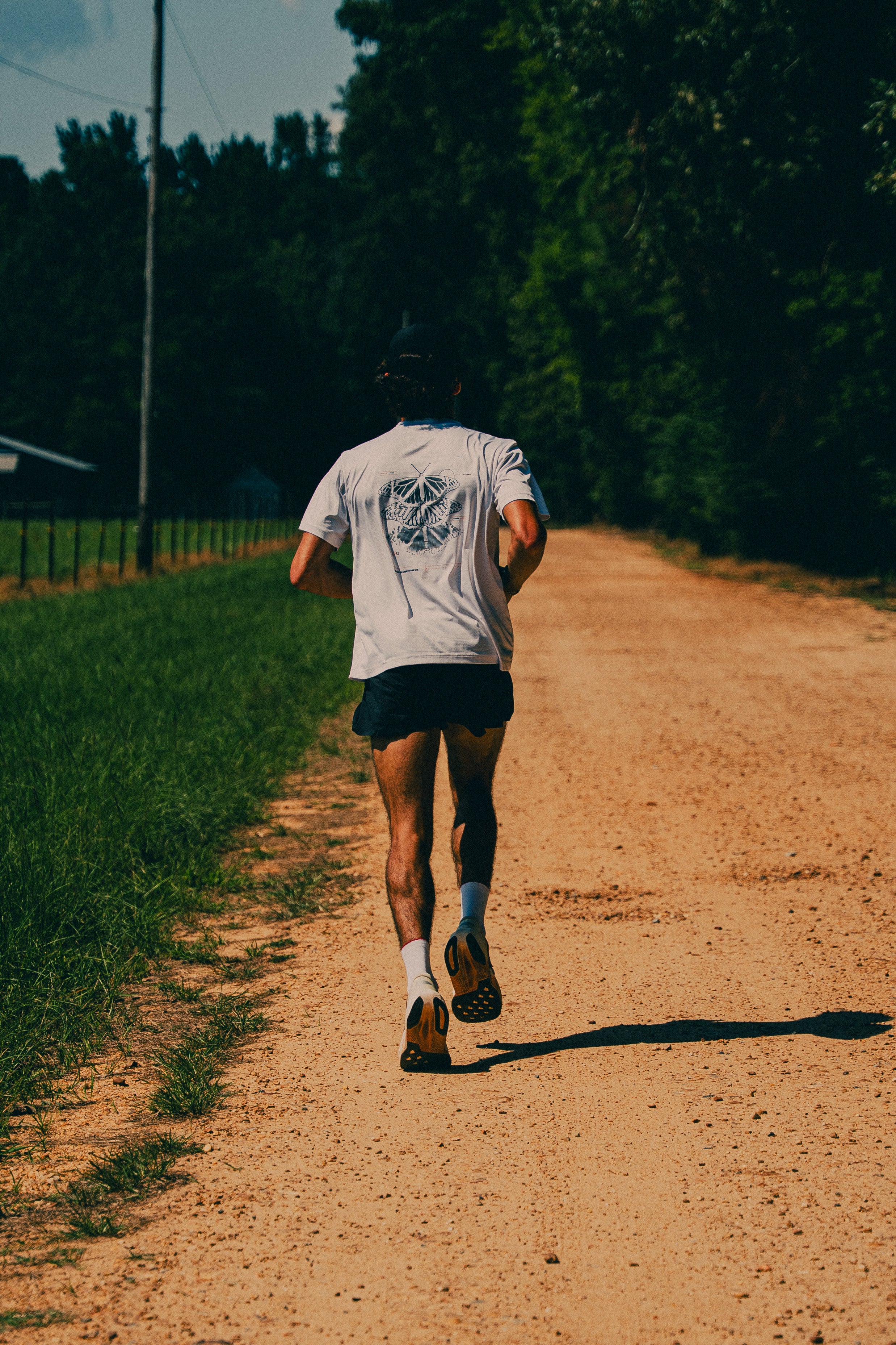 Metamorphosis Performance Tee